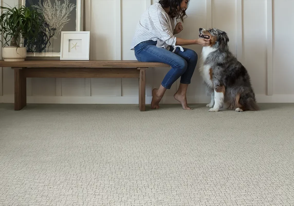 happy lady playing with dog